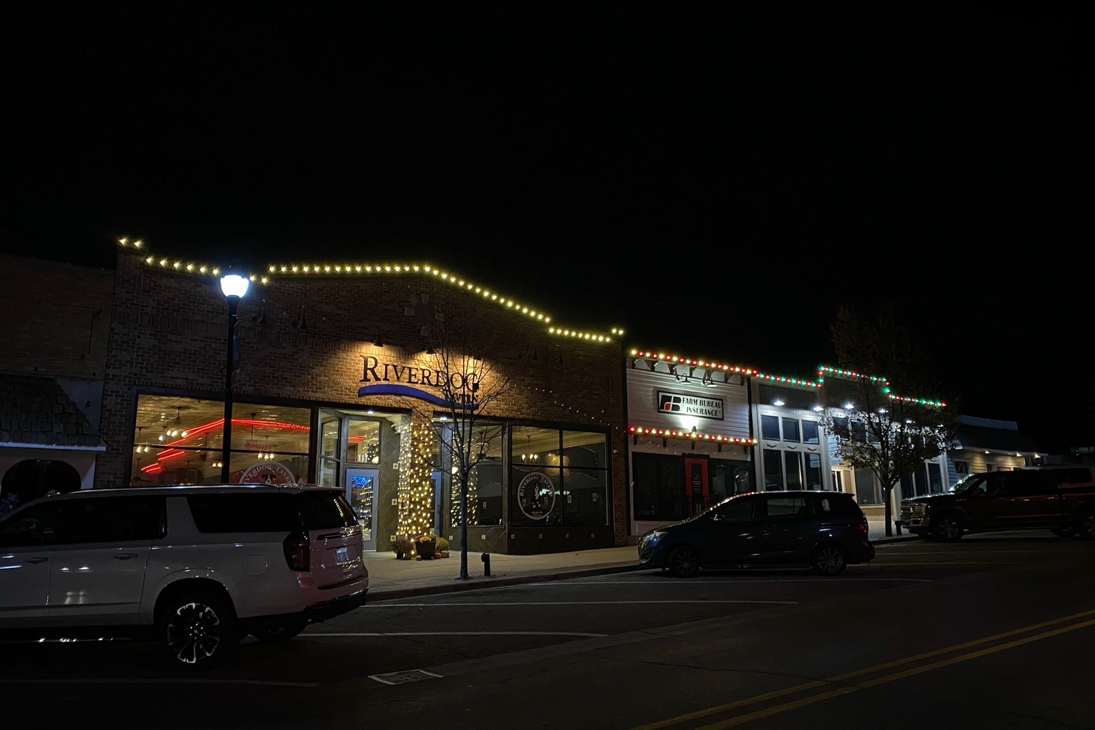 Holiday lighting on a business complex